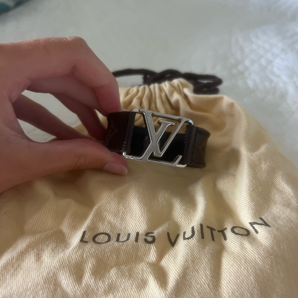 Louis Vuitton bracelet! Silver monogram with the classic monogram leather band.